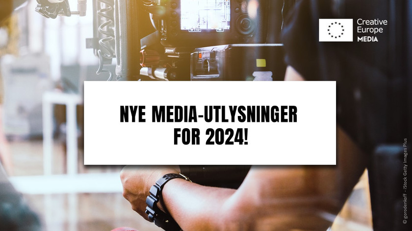 Nye MEDIA-utlysninger for 2024! Creative Europe MEDIA. En person står bak et kamera og filmer. Foto.